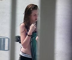 Tiny bikini gal admired by hunter