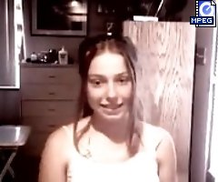 Naughty teenage doll playing before web cam